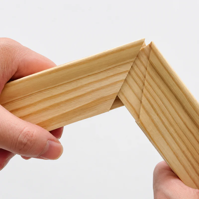 Precision wooden stretcher bar corner joint close up